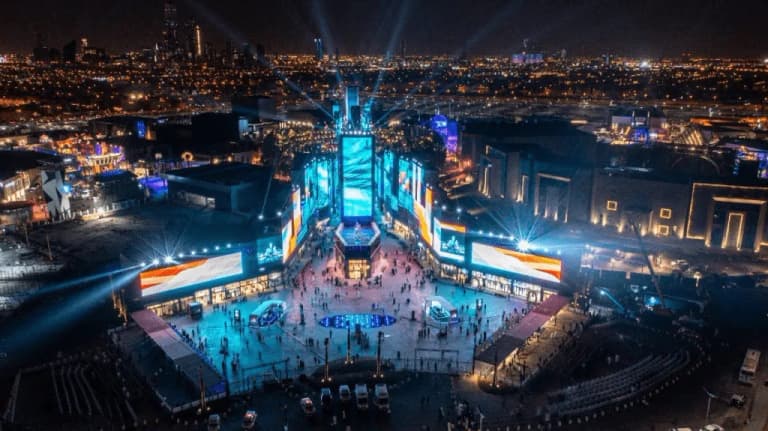 Themed zone inside Boulevard Riyadh City with colourful lights and visitors