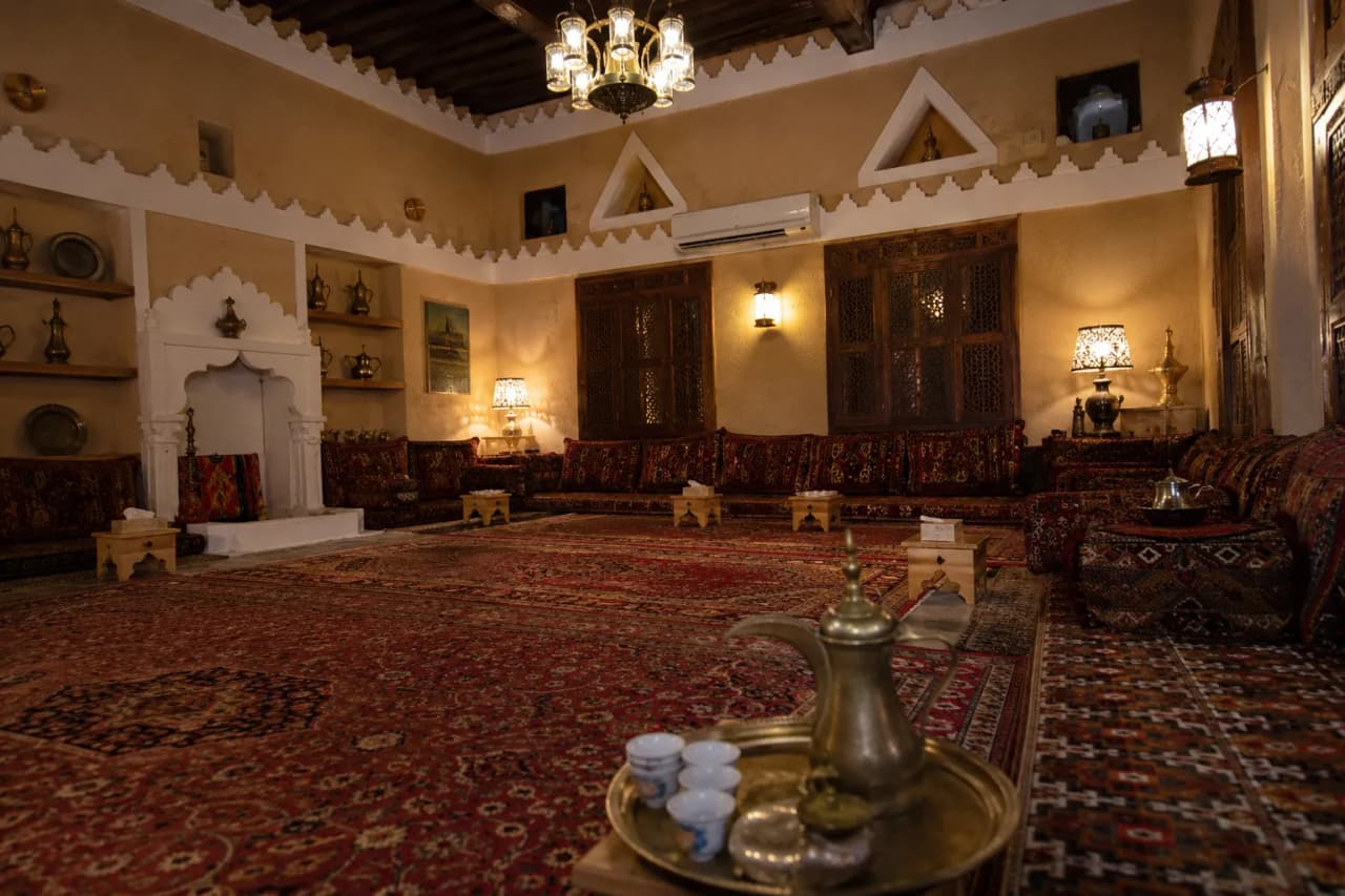 Traditional Saudi Arabian majlis with cushions and Arabic coffee