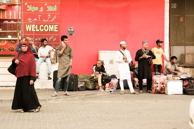 Diverse group of people with luggage in Saudi Arabia