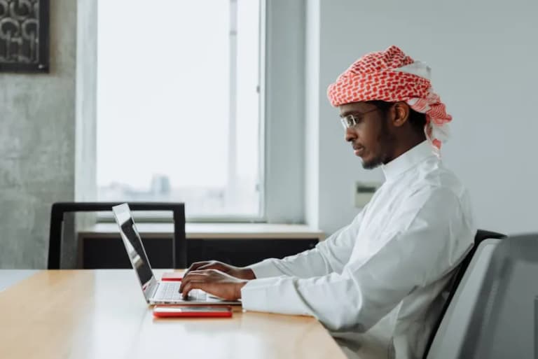 Saudi professional working in an office
